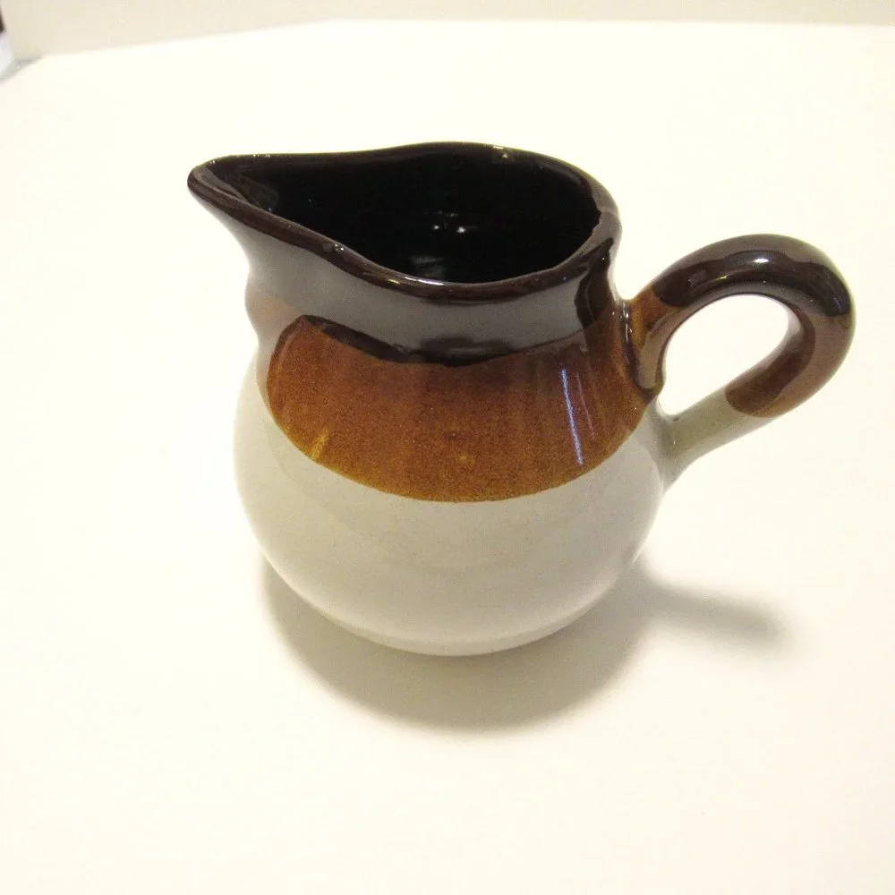 Brown and White Ceramic Serveware Pitcher